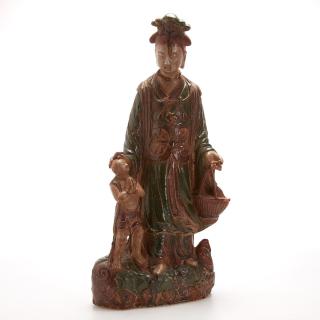 Appraisal: Large Sancai glazed earthenware Guanyin Large Sancai glazed earthenware Guanyin