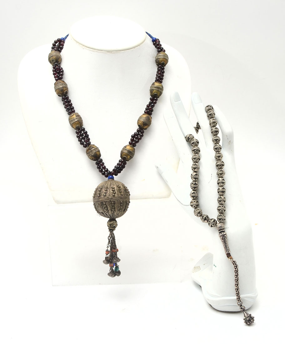 Appraisal: SILVER PRAYER BEADS AND SILVER NECKLACE WITH GARNETS Possibly Islamic