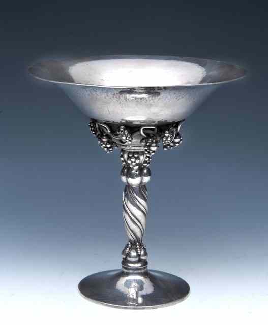 Appraisal: A GEORGE JENSEN SILVER TAZZA with twisted stem turned flared