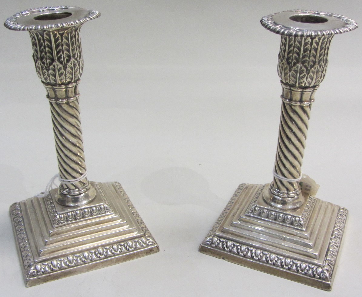 Appraisal: A pair of late Victorian silver candlesticks each with a