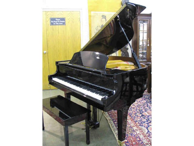 Appraisal: Wurlitzer gloss black ' grand piano Model C serial number