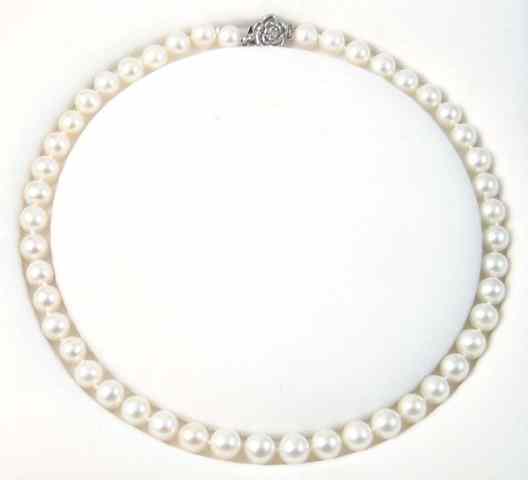 Appraisal: PRINCESS LENGTH PEARL NECKLACE strung with well matched white pearls