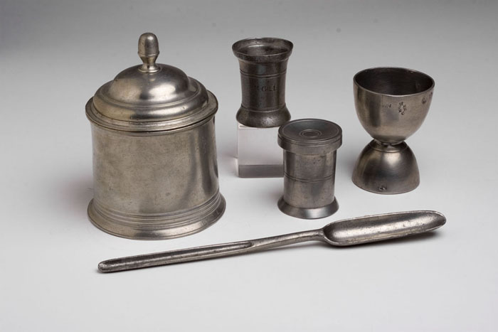 Appraisal: FIVE UNUSUAL ENGLISH PEWTER TABLE OBJECTS Including a cylindrical tobacco