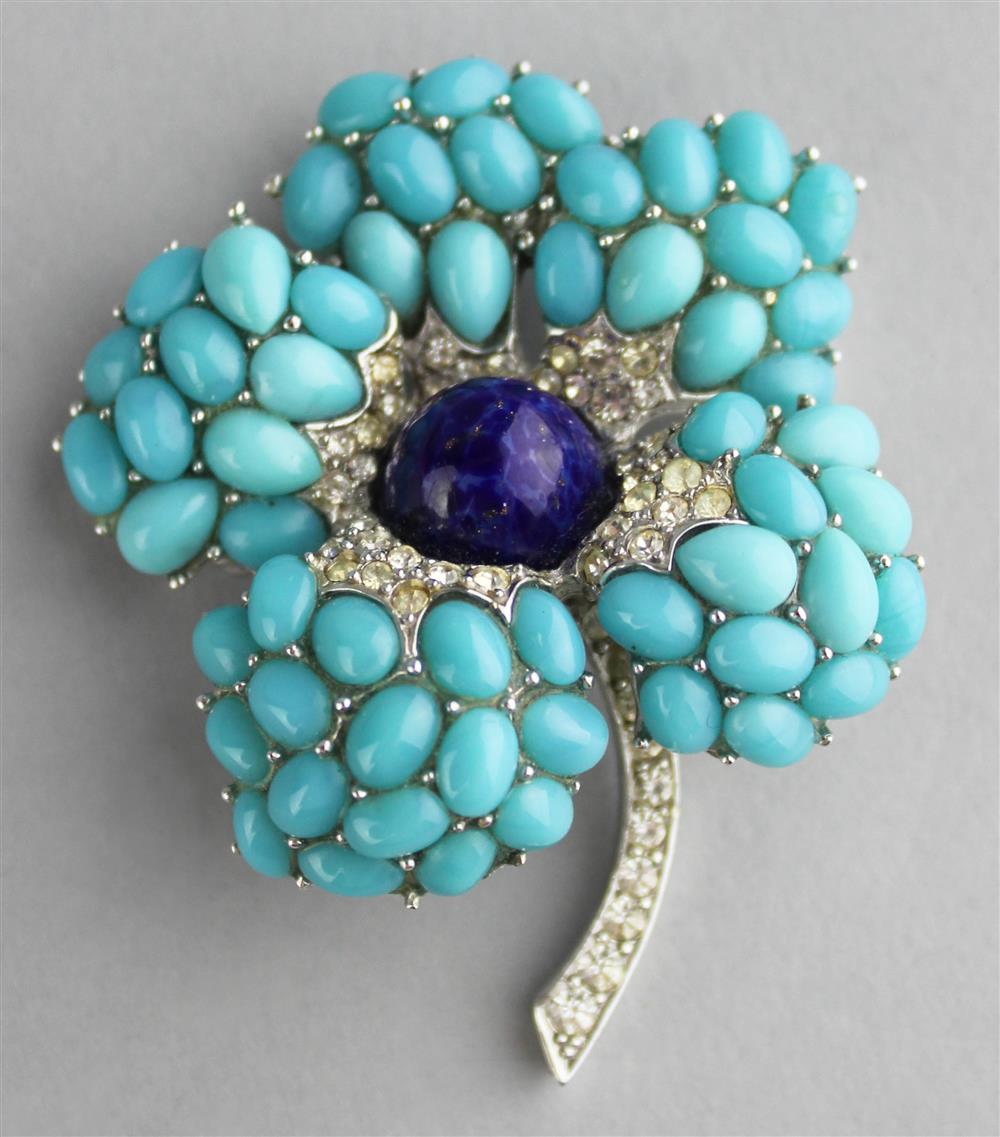 Appraisal: BOUCHER FLOWER PIN WITH TURQUOISE COLORED STONES COLORLESS RHINESTONES AND