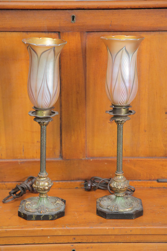 Appraisal: PAIR OF TABLE LAMPS Unattributed Marble bases with embossed metal