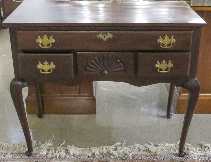 Appraisal: QUEEN ANNE STYLE MAHOGANY LOWBOY American c featuring one long