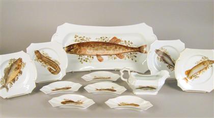 Appraisal: Continental porcelain fish service th century Comprising a fish platter