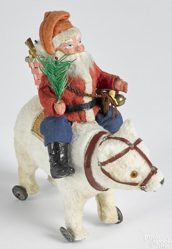 Appraisal: Painted composition Santa and polar bear pull toy Painted composition