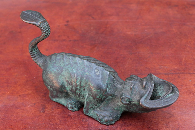 Appraisal: A ROMAN BRONZE OIL LAMP in the form of a