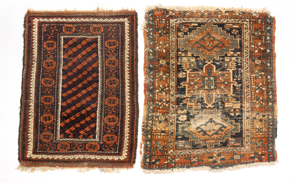 Appraisal: TWO CAUCASIAN RUGS Early th century Belouch with multiple borders