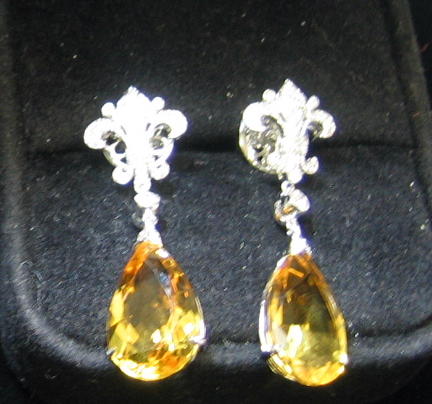 Appraisal: CITRINE AND DIAMOND EARRINGS k white gold dangling pierced earrings