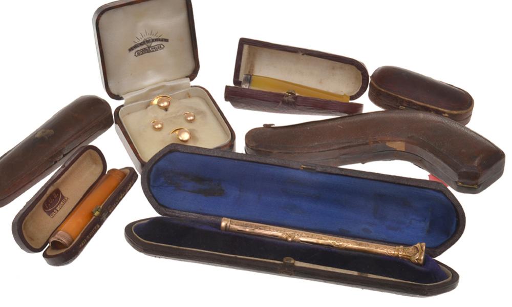 Appraisal: COLLECTION OF BOXED CIGARETTE HOLDERS SEAL AND A BOXED SET