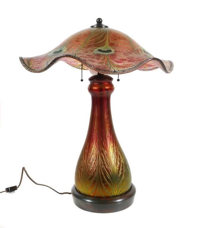 Appraisal: Charles Lotton Peacock pattern table lamp Six beautiful peacock feathers