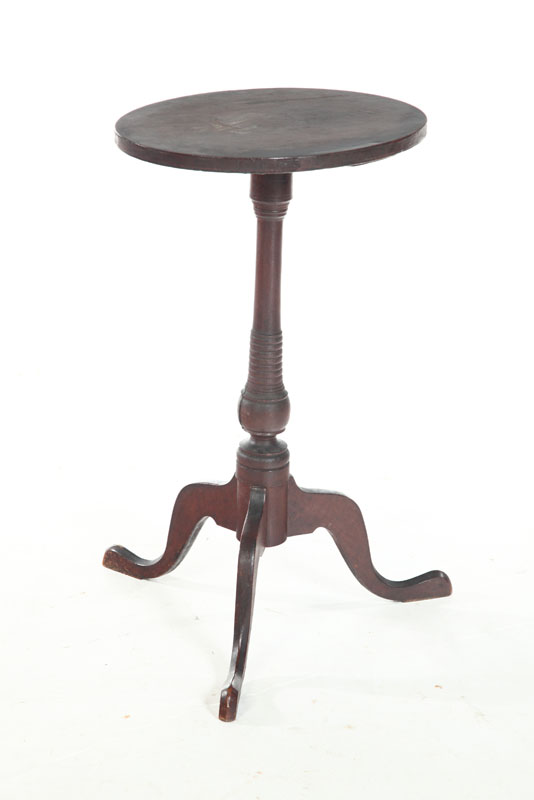 Appraisal: CANDLESTAND American early th century cherry Tripod base with cutout