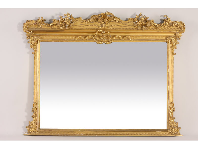 Appraisal: Monumental Gilded Over Mantel Mirror th c rectangular form with