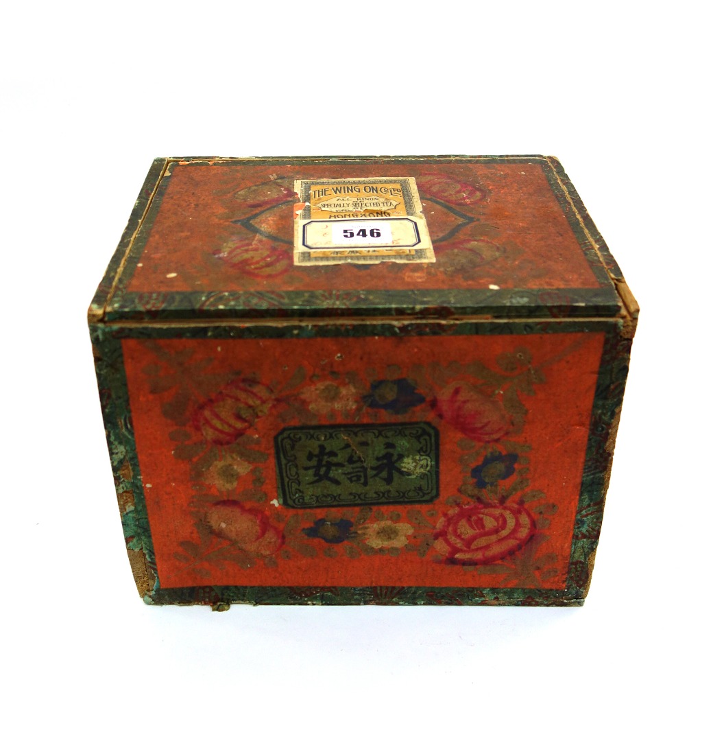 Appraisal: A Chinese slide top tea box painted and applied labels