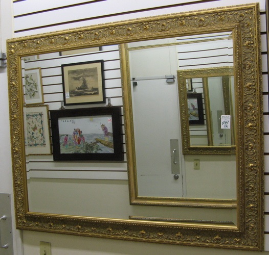 Appraisal: TWO GILT WOOD RECTANGULAR WALL MIRRORS both beveled Overall in