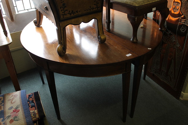 Appraisal: A PAIR OF GEORGIAN MAHOGANY DEMI-LUNE DINING TABLE ENDS of