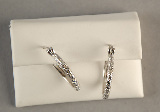 Appraisal: Sterling and Diamond Hoop Earrings textured hoop earrings set with