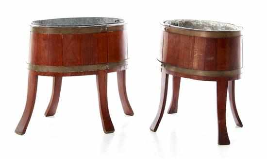 Appraisal: Pair Edwardian fruitwood wine coolers circa oval stave-constructed tubs with