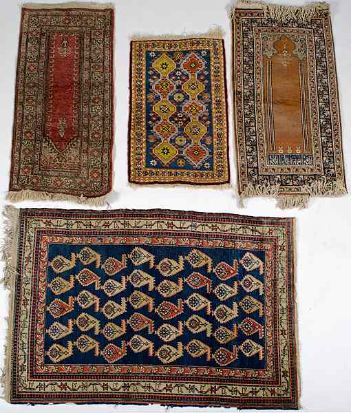 Appraisal: Turkish Rugs Turkish th century includes four rugs largest x