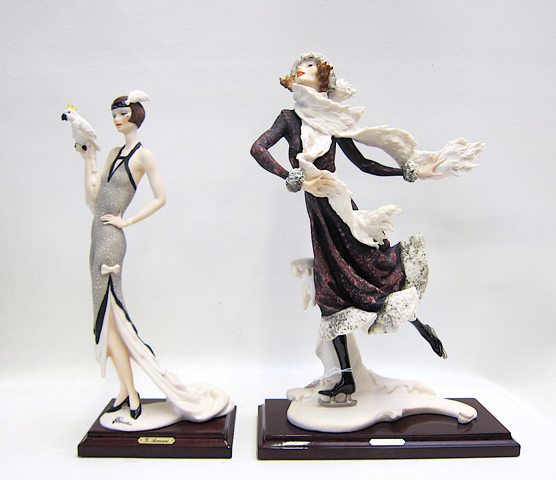 Appraisal: GUISEPPI ARMANI FIGURAL SCULTURES two pieces Skating Girl - Winter