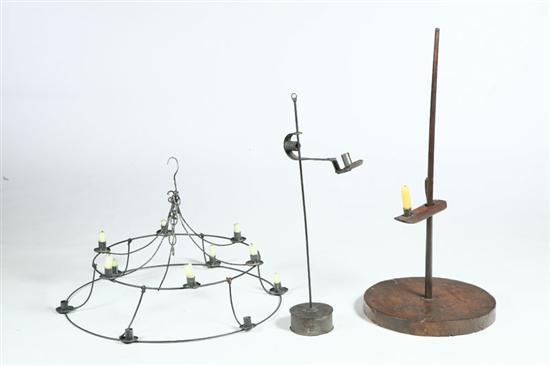 Appraisal: THREE LIGHTING DEVICES Probably American th century Round wire candle