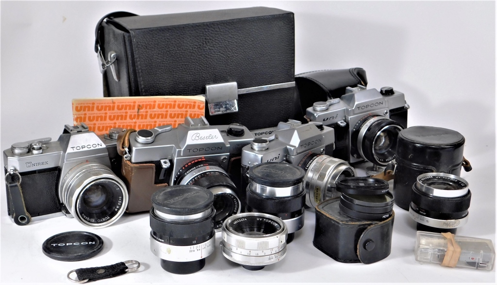 Appraisal: GROUP OF TOPCON CAMERAS AND ACCESSORIES Group of Topcon mm