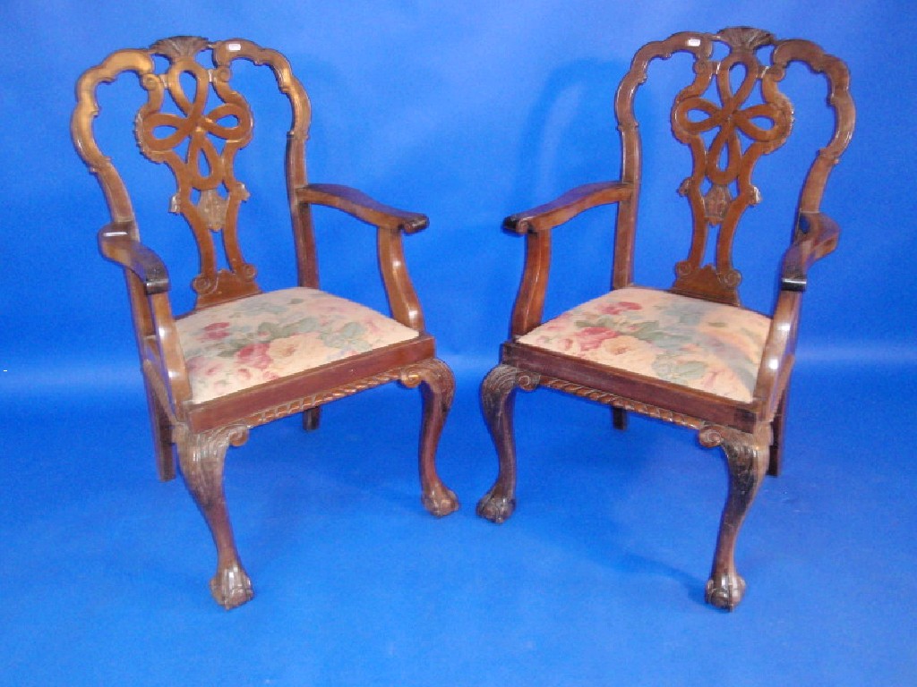 Appraisal: A pair of early thC Chippendale style carver chairs with