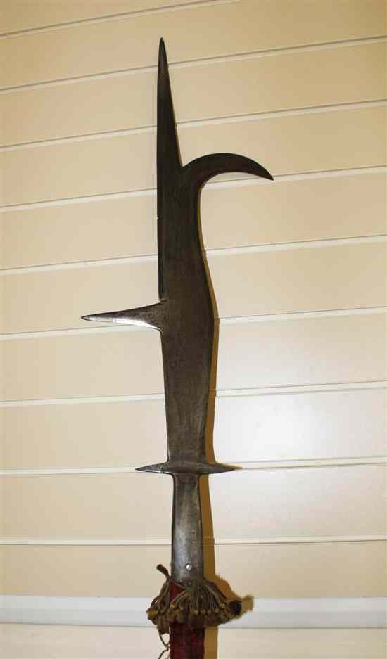 Appraisal: An Italian polearm bill or 'Roncone' the head struck twice