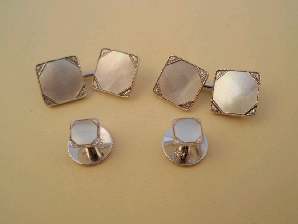 Appraisal: A pair of bar link mother of pearl white metal