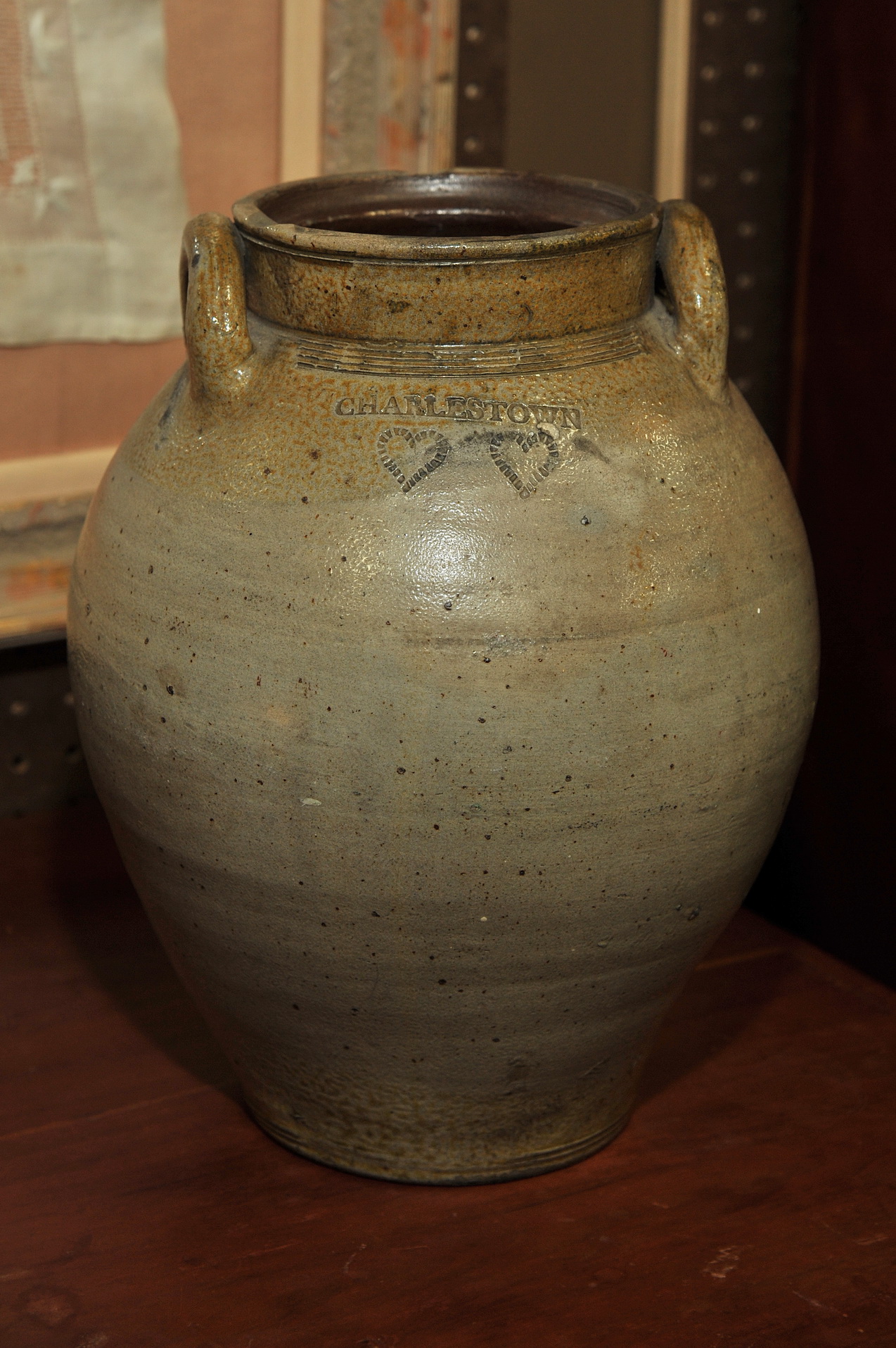 Appraisal: CHARLESTOWN STONEWARE CROCK Massachusetts th century Ovoid form having loop