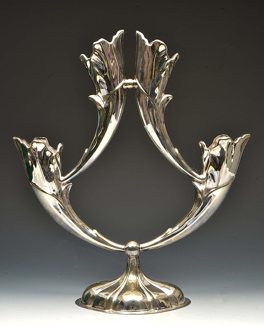 Appraisal: Siliver plated two branch candelabraon circular platform base with acanthus