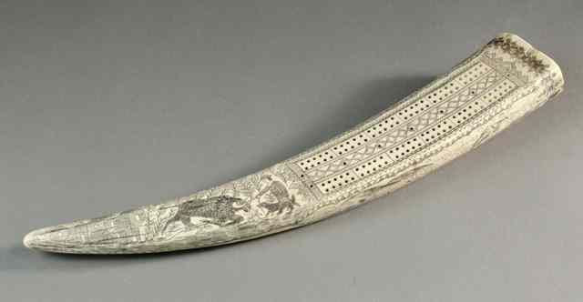 Appraisal: AN AMERICAN TH CENTURY WALRUS TUSK scrimshawed all over with