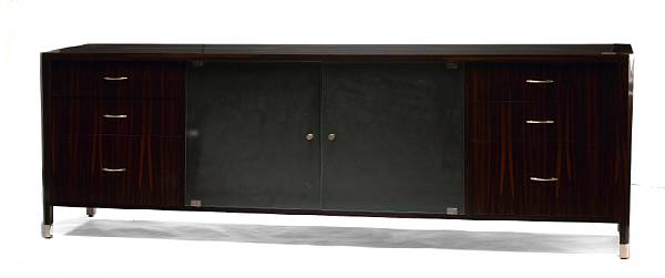 Appraisal: An Art Deco style macassar ebony and silvered-metal buffet height