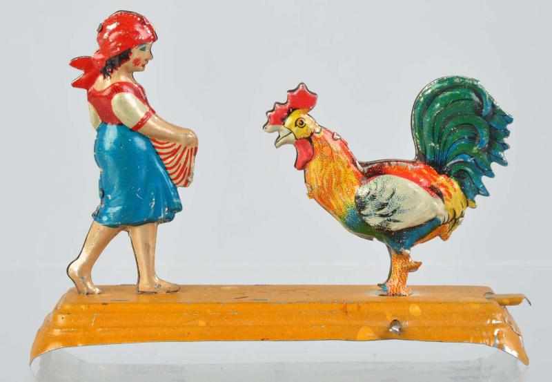 Appraisal: Scarce Tin Litho Girl Rooster Penny Toy German Push-lever activated