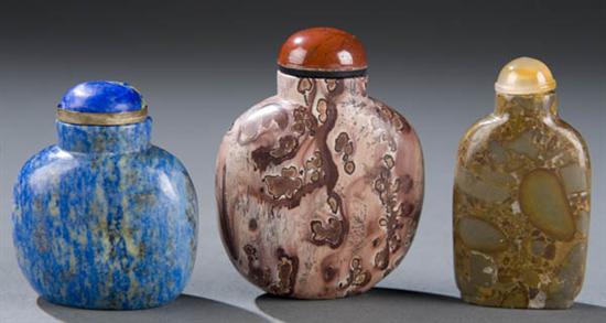 Appraisal: Group of three Chinese stone snuff bottles Lapis bottle with