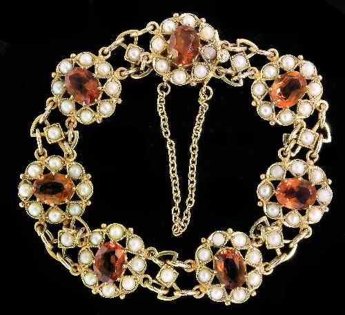 Appraisal: A ct gold citrine and pearl mounted bracelet the seven