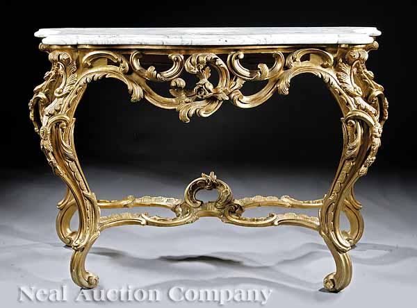 Appraisal: A Louis XV-Style Carved and Giltwood Console the variegated serpentine