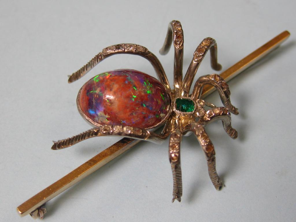 Appraisal: A large Spider Brooch set large opal emerald and chip