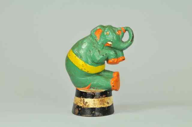 Appraisal: ELEPHANT ON BARREL DOORSTOP Cast iron marked '' No ''Taylor