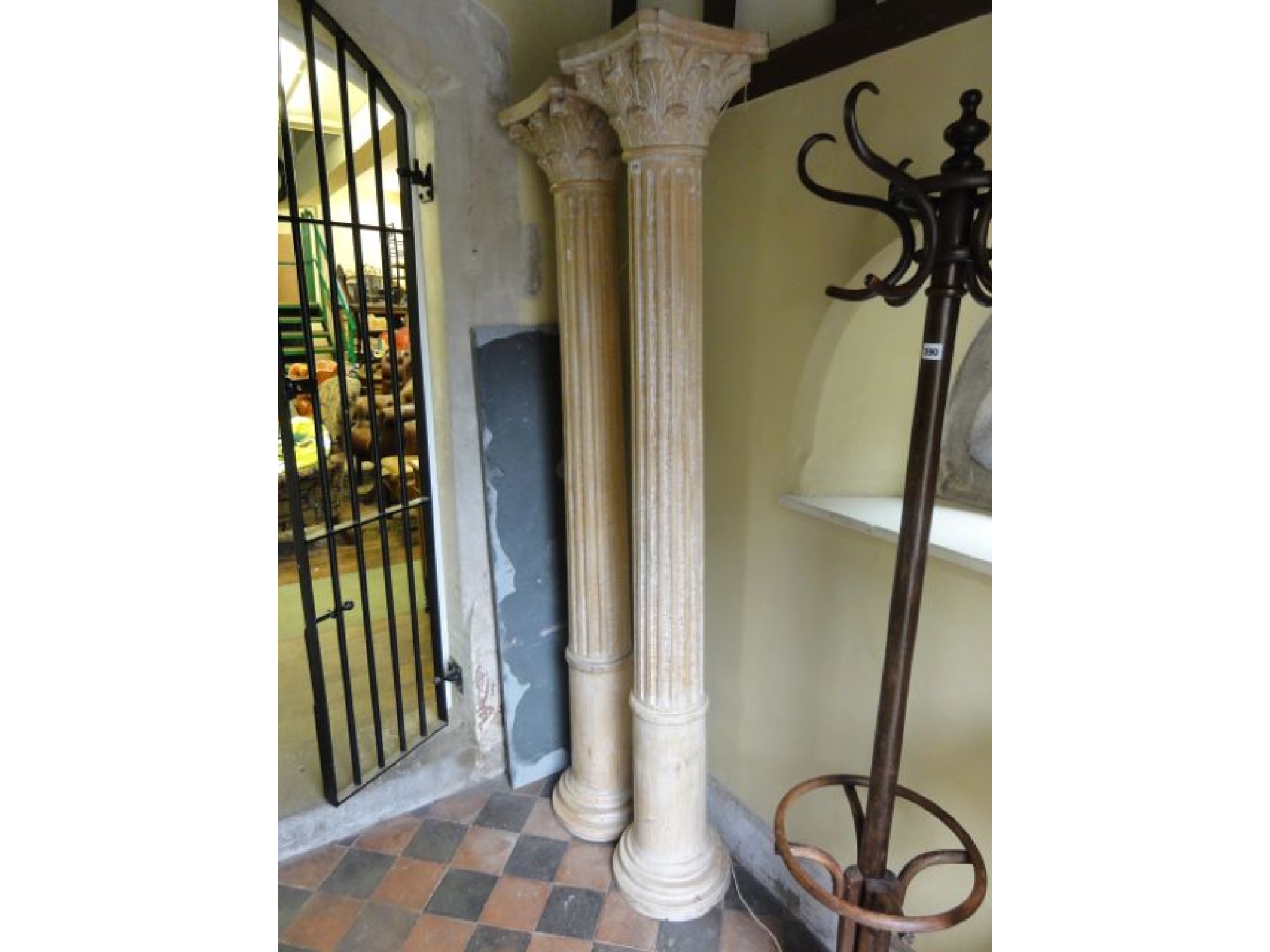 Appraisal: A pair of contemporary carved wooden ornamental fluted columns with