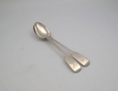 Appraisal: A pair of Victorian silver Fiddle pattern basting spoons by