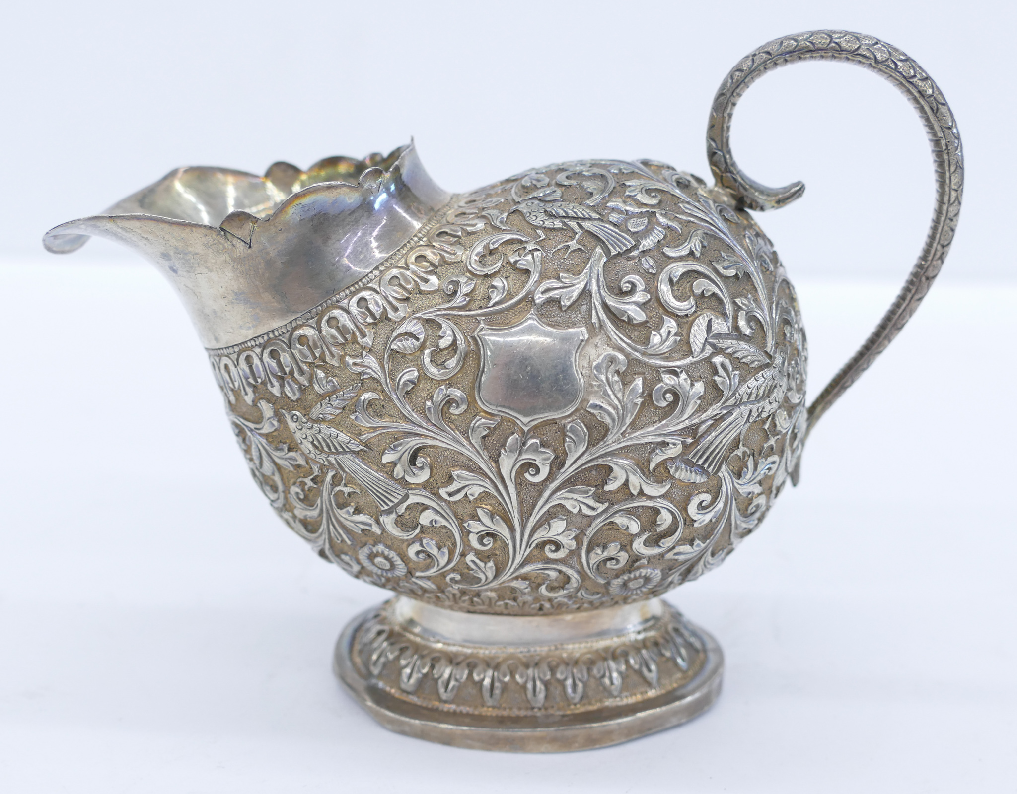 Appraisal: Indian th Cent Kutch Silver Creamer ''x '' Repousse scrolling