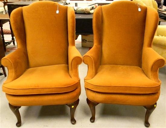 Appraisal: Pair of rust color velvet wing back chairs rolled arms