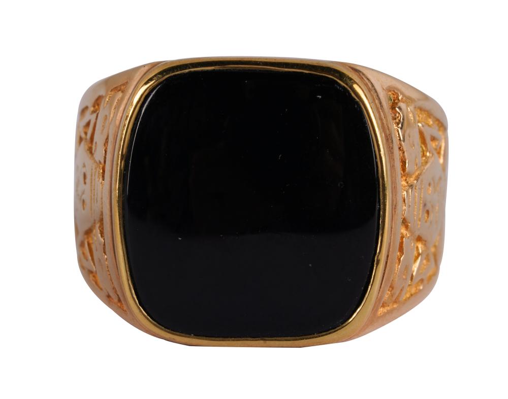 Appraisal: KARAT YELLOW GOLD ONYX RINGcentering one rounded-corner rectangular tablet cut