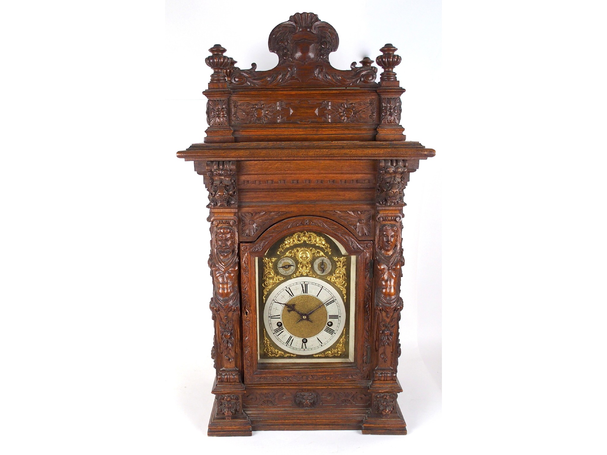 Appraisal: A large Victorian oak cased bracket clock and bracketthe brass