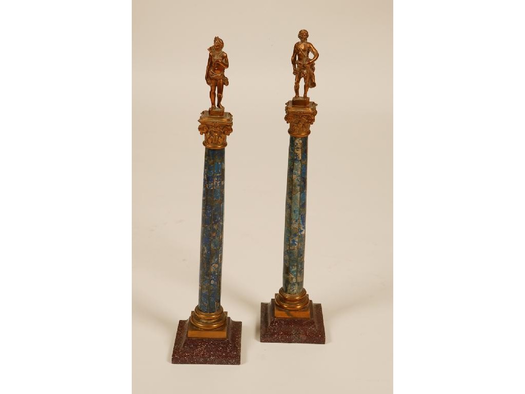 Appraisal: A PAIR OF BAROQUE STYLE LAPIS LAZULI COLUMNS with gilt