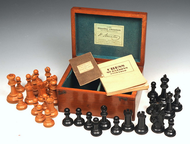 Appraisal: A STAUNTON BOXWOOD CHESS SET with instructions in original mahogany