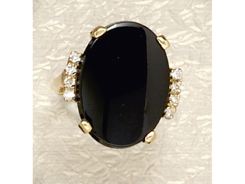 Appraisal: ONYX AND DIAMOND RING Lady's k yellow gold ring set